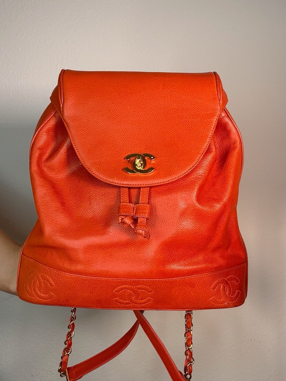 CHANEL Orange Caviar Leather Backpack with CC Trim and Gold Hardware